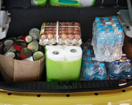 A car boot filled with eggs, tinned food, water bottles